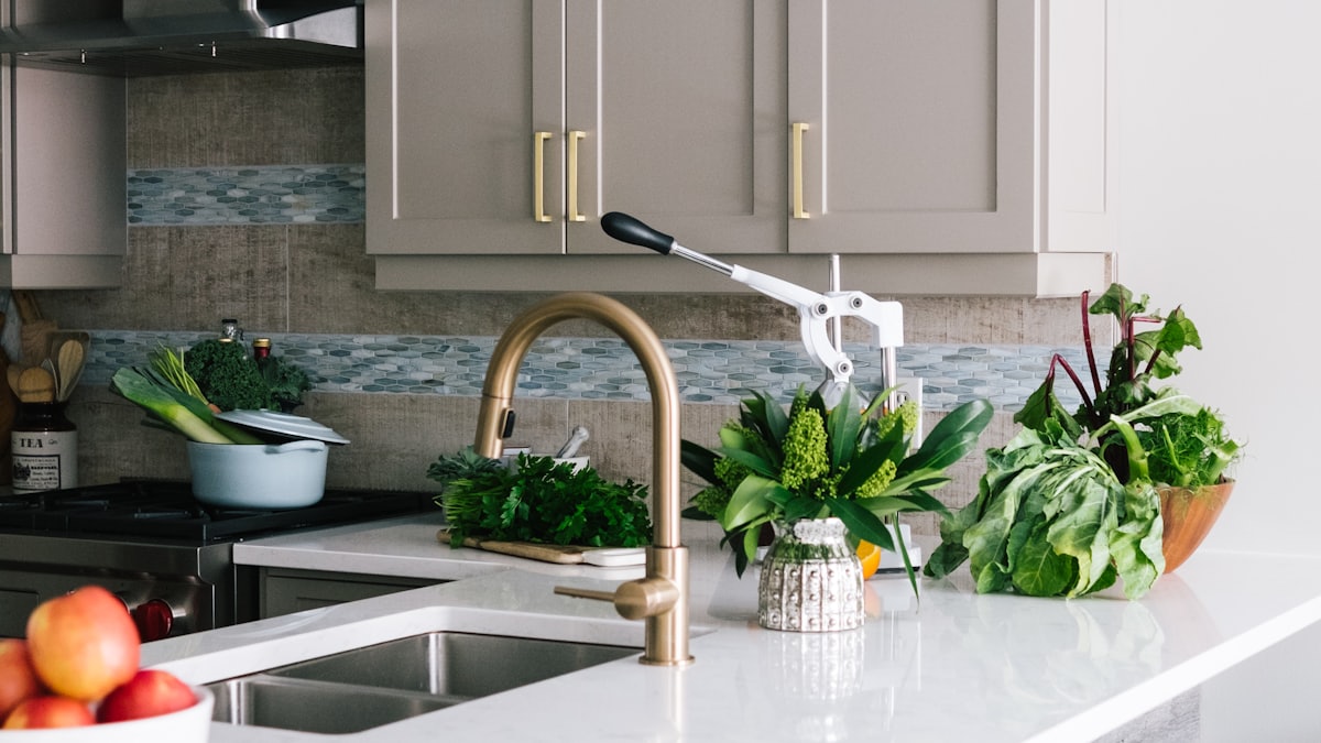 Kitchen with glass pendant lights over the island