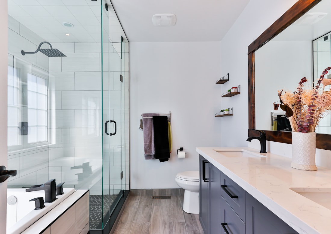 Bathroom room set with IP-rated downlights and mirror lighting